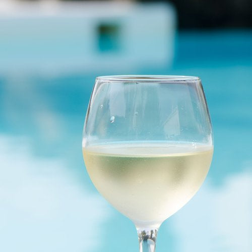 white_wine_glass_at_pool